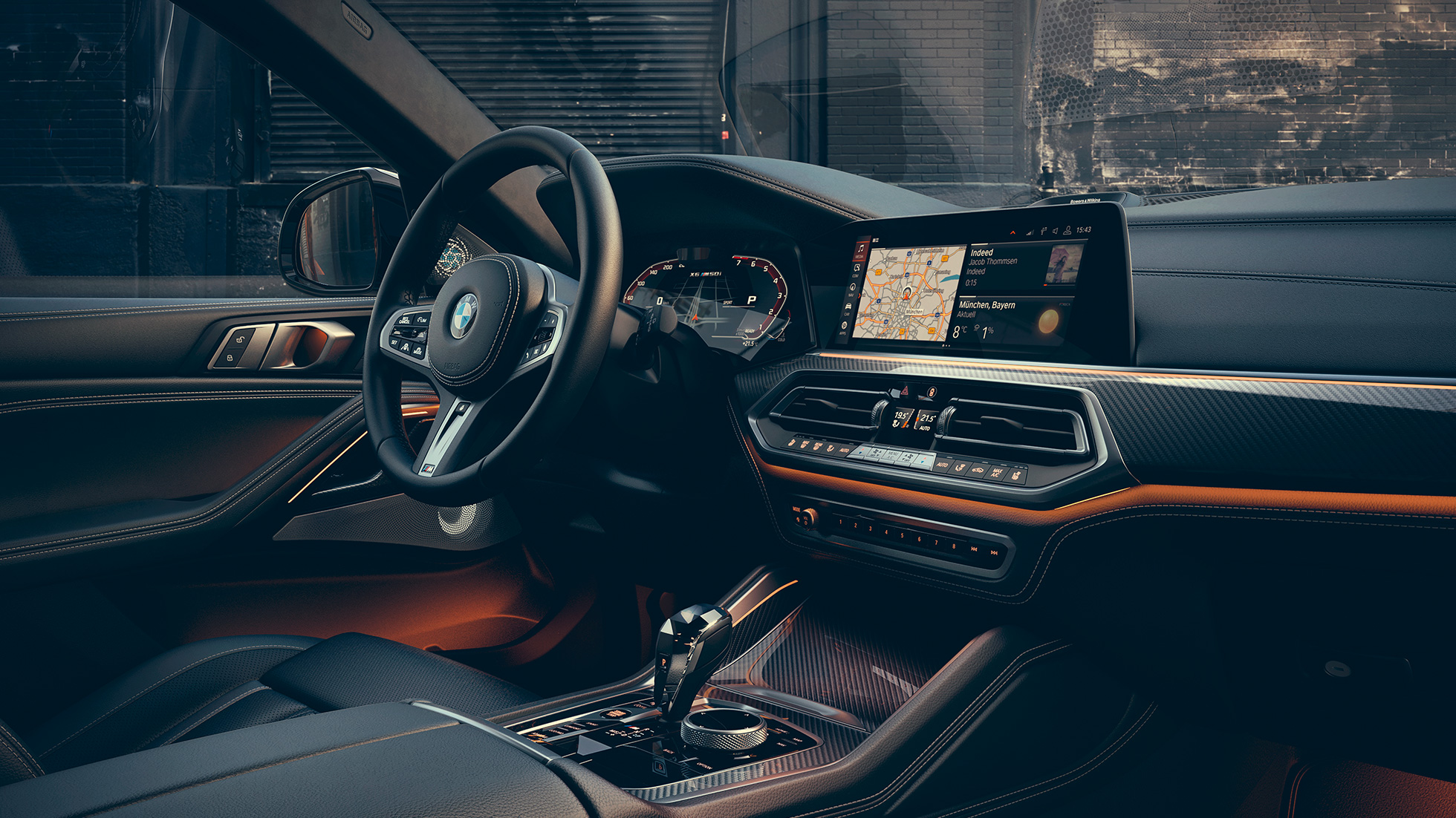 BMW X6 M50i salons BMW X6 M50i salona tuvplāns ar skatu uz viduskonsoli.