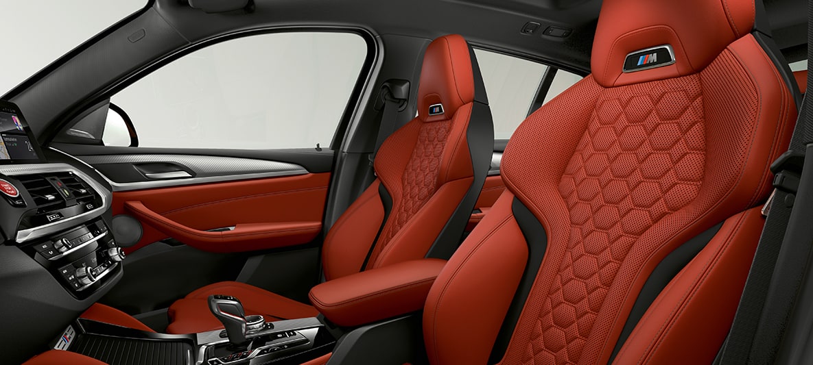 BMW X4 M, Merino ādas sporta sēdekļi Sakhir Orange krāsā. BMW X4 M, salons, Merino ādas sporta sēdekļi Sakhir Orange krāsā.