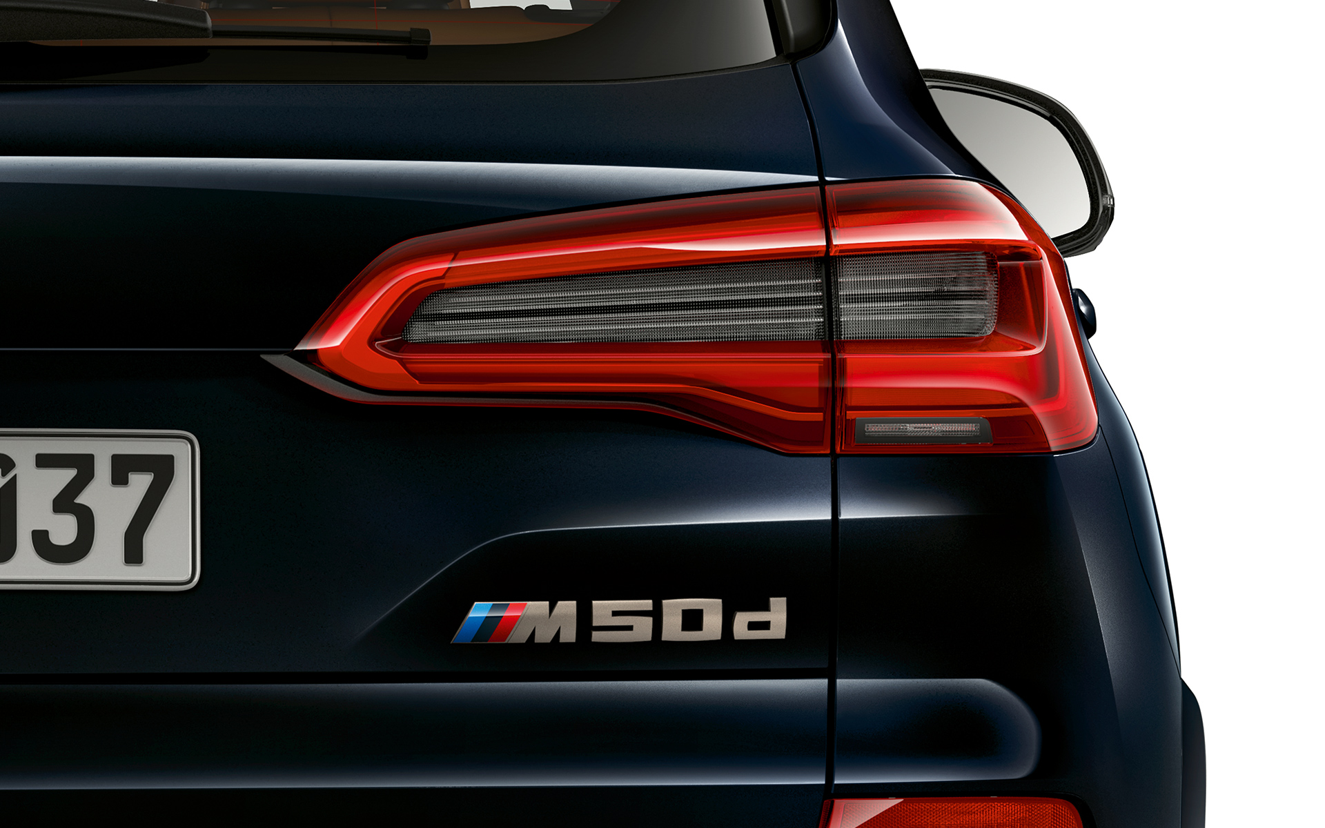 BMW X5 M50d aizmugures uzraksts BMW X5 M50d modeļa nosaukuma detalizēts skats