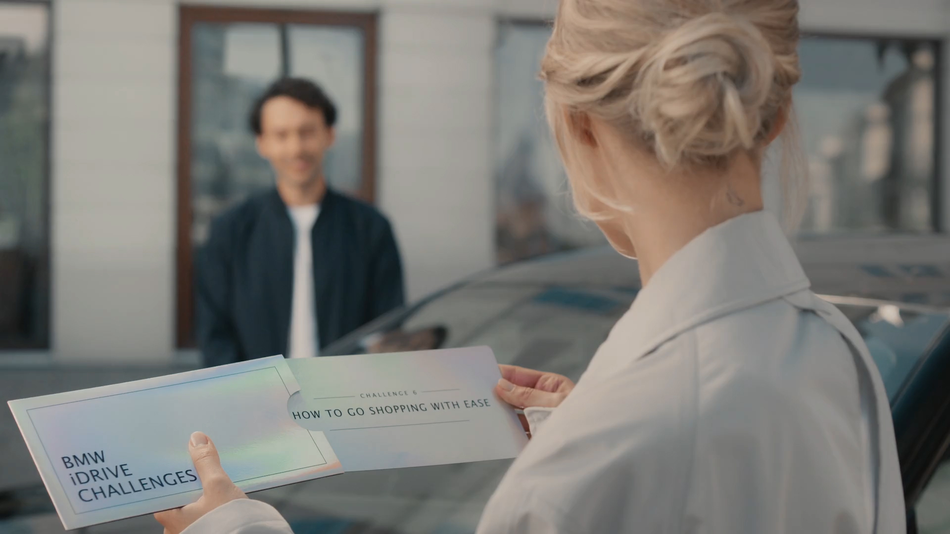 BMW iDrive izaicinājums, iepirkšanās BMW iDrive izaicinājums, iepirkšanās, G70, aploksne ar izaicinājumu